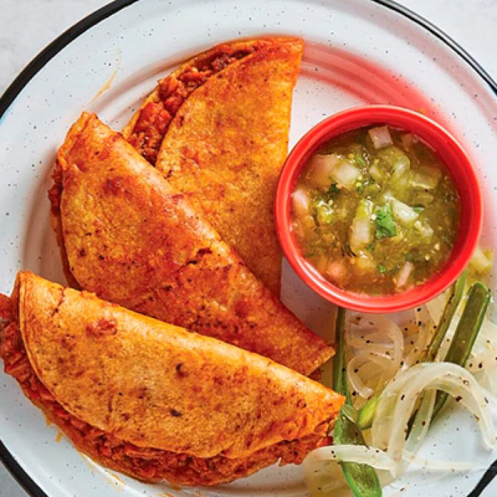 5 taquitos de frijoles refritos